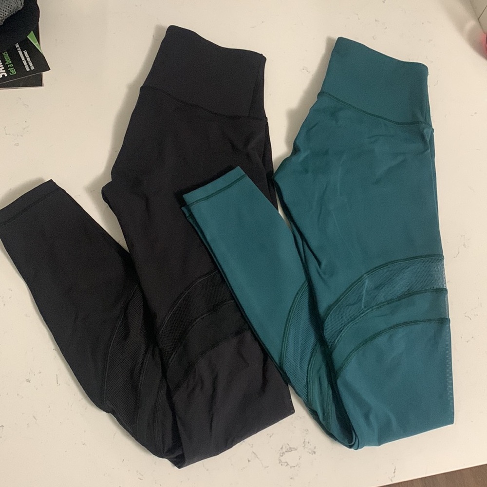 TWO Lululemon full length women’s size 4 mesh pants